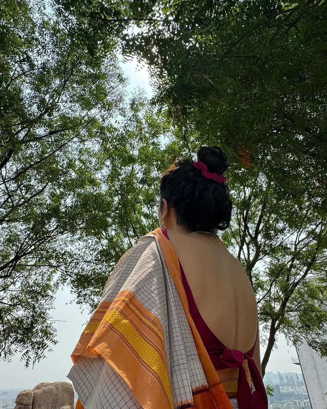 Malvika Nair in White Saree Sleeveless Red Blouse